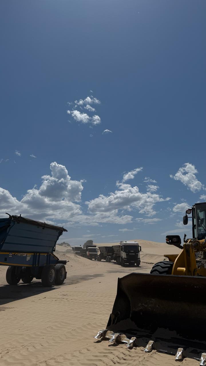 CWG Logistics long-distance convoy of trucks across sand terrain